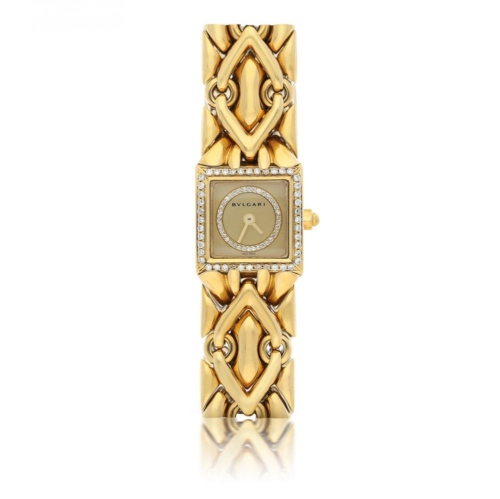 BULGARI | REF BJ 07 TRIKA, A YELLOW GOLD AND DIAMOND SET BRACELET WATCH CIRCA 1995