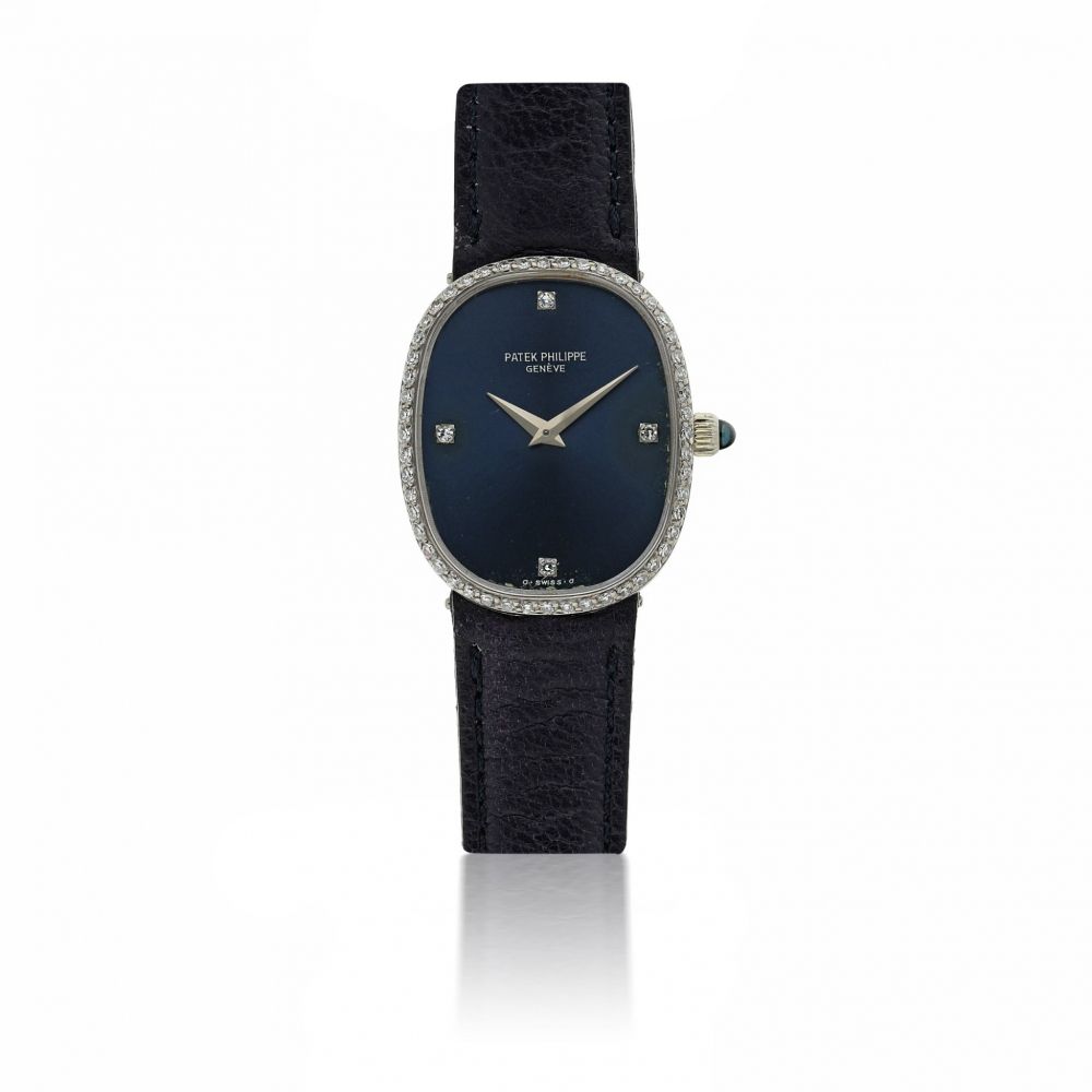 PATEK PHILIPPE | REF 4382 ELLIPSE, A WHITE GOLD AND DIAMOND SET OVAL WRISTWATCH CIRCA 1985