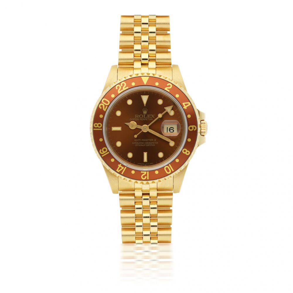 ROLEX | GMT-MASTER II REF 16718, A YELLOW GOLD AUTOMATIC DUAL TIME WRISTWATCH WITH DATE AND BRACELET CIRCA 1990