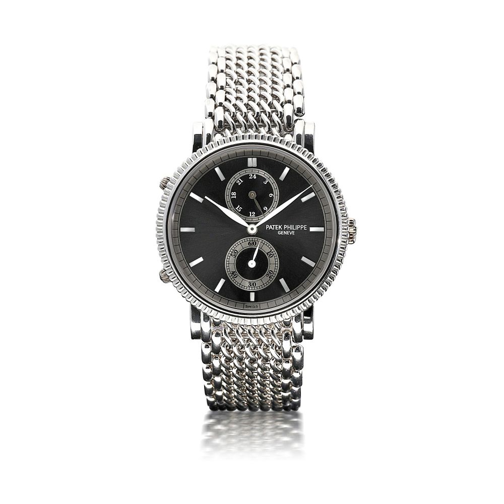 PATEK PHILIPPE | REFERENCE 5034G TRAVEL TIME A WHITE GOLD DUAL TIME WRISTWATCH WITH 24-HOUR INDICATION, CIRCA 2000
