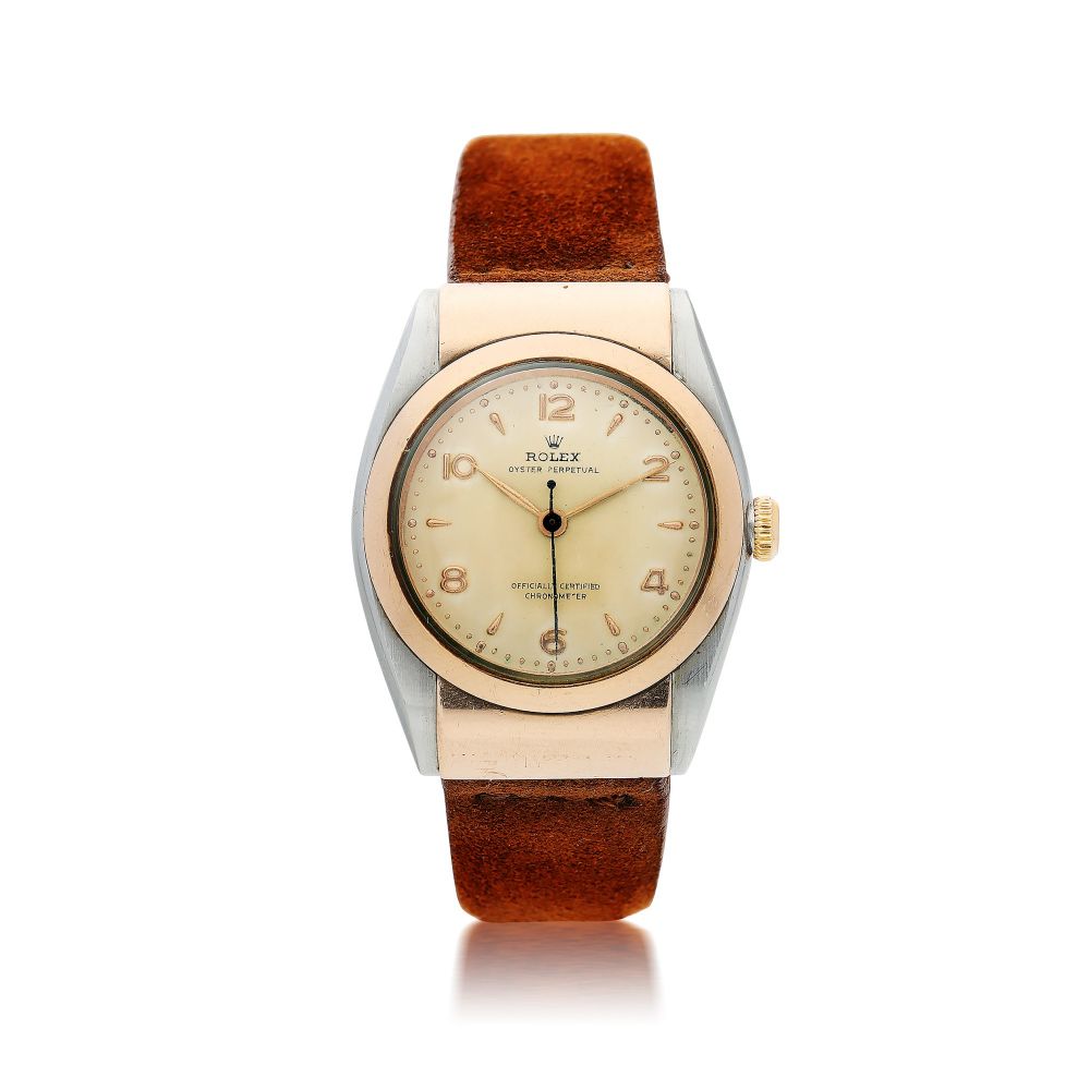 ROLEX | REFERENCE 3065 BUBBLEBACK A PINK GOLD AND STAINLESS STEEL AUTOMATIC WRISTWATCH WITH HOODED LUGS, CIRCA 1950