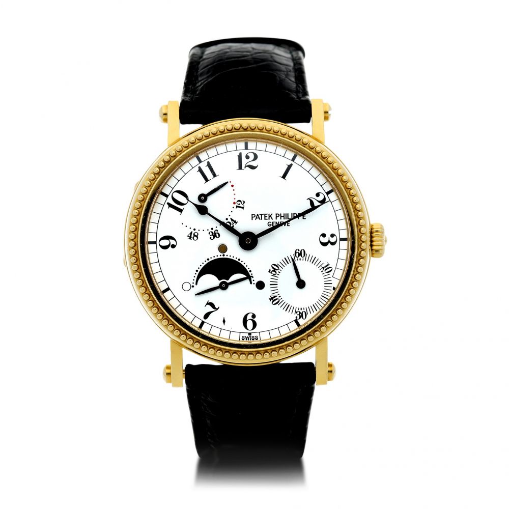 PATEK PHILIPPE | REFERENCE 5015 A YELLOW GOLD AUTOMATIC WRISTWATCH WITH MOON PHASES AND POWER RESERVE, MADE IN 1996