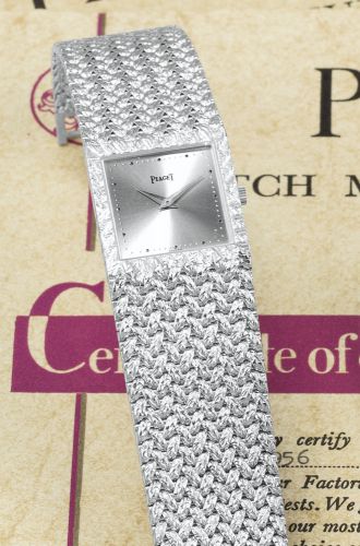 Piaget.A WHITE GOLD SQUARE BRACELET WATCH REF 9352 SERIAL 328761 CIRCA 1979