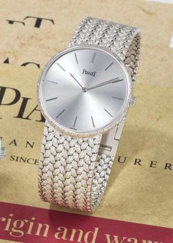 Piaget.A WHITE GOLD BRACELET WATCH REF 9065 SERIAL 587170 TRADITION CIRCA 1992