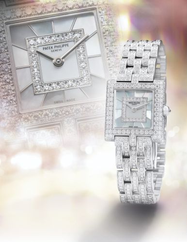 Patek Philippe.A LADY'S WHITE GOLD AND DIAMOND-SET SQUARE WRISTWATCH WITH MOTHER-OF-PEARL DIAL AND BRACELET REF 4874/1 MVT 1660170 CASE 4102805 MADE IN 2000