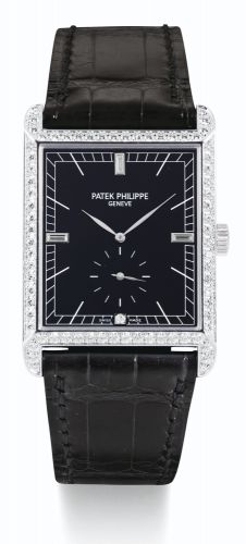Patek Philippe.A WHITE GOLD AND DIAMOND-SET RECTANGULAR WRISTWATCH REF 5112 MVT 3569299 CASE 4472769 GONDOLO MADE IN 2008