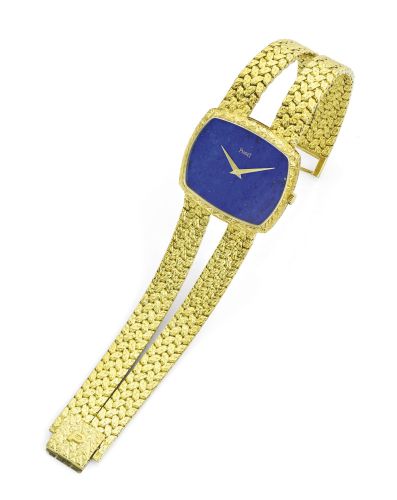 Piaget.A FINE YELLOW GOLD AND LAPIS LAZULI BRACELET WATCH REF 9731 D 210 CASE 219530 MVT 7311838 CIRCA 1970