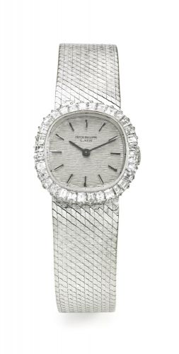 Patek Philippe.A LADY'S WHITE GOLD AND DIAMOND-SET CUSHION-FORM BRACELET WATCH REF 3395/1 MVT 1240489 CASE 2689394 MADE IN 1970