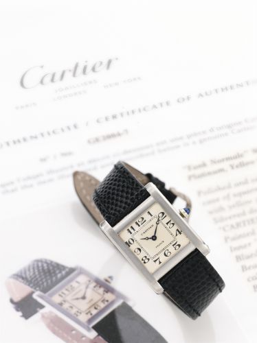 Cartier.A FINE AND RARE PLATINUM AND YELLOW GOLD RECTANGULAR WRISTWATCH NO 22424 2718 14785 CIRCA 1924