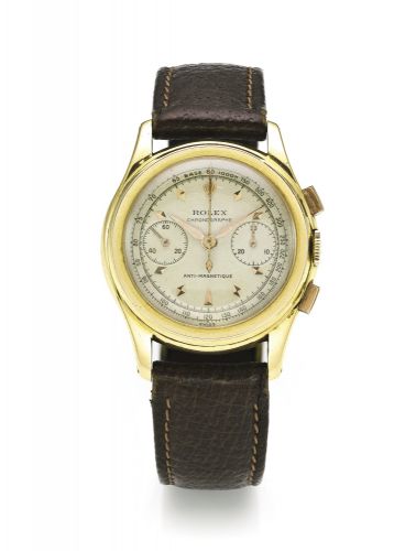Rolex.A FINE YELLOW GOLD CHRONOGRAPH WRISTWATCH WITH REGISTER AND TACHOMETER REF 3055 CASE 85725 PICCOLINO CIRCA 1945
