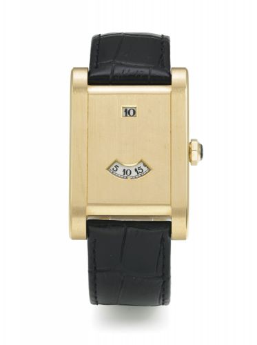 Cartier.A LIMITED EDITION PINK GOLD RECTANGULAR JUMP HOUR WRISTWATCH REF 2817 5/100 TANK A GUICHET COLLECTION PRIVEE CIRCA 2006