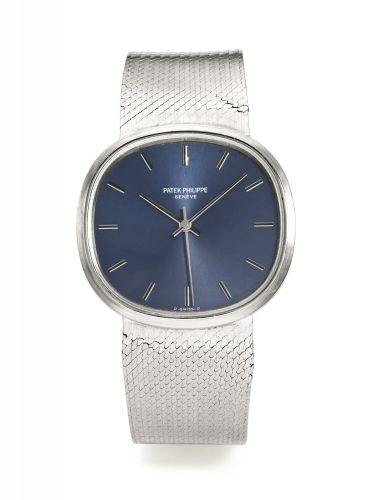 Patek Philippe.A LARGE WHITE GOLD CUSHION-FORM AUTOMATIC CENTRE SECONDS BRACELET WATCH REF 3586/1 MVT 1491678 CASE 2721032 MOVEMENT MADE IN 1989