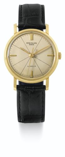 Patek Philippe.A YELLOW GOLD CENTER SECONDS WRISTWATCH WITH YELLOW COLOURED DIAL, RETAILED BY GÜBELIN REF 3423 MVT 709173 CASE 2619015 MADE IN 1961