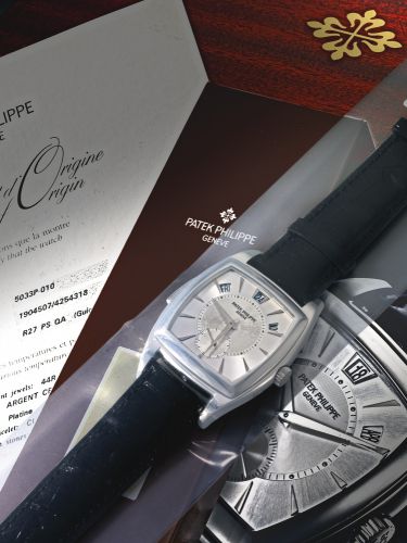 Patek Philippe.A IMPORTANT AND RARE PLATINUM TONNEAU-FORM AUTOMATIC MINUTE REPEATING ANNUAL CALENDAR WRISTWATCH REF 5033 MVT 1904507 CASE 4254318 CIRCA 2008