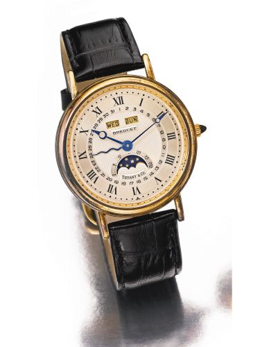 Breguet.RETAILED BY TIFFANY CO: A FINE YELLOW GOLD AUTOMATIC WRISTWATCH WITH TRIPLE DATE AND MOON PHASES REF 3040 NO 3332 SERPENTINE CIRCA 1990