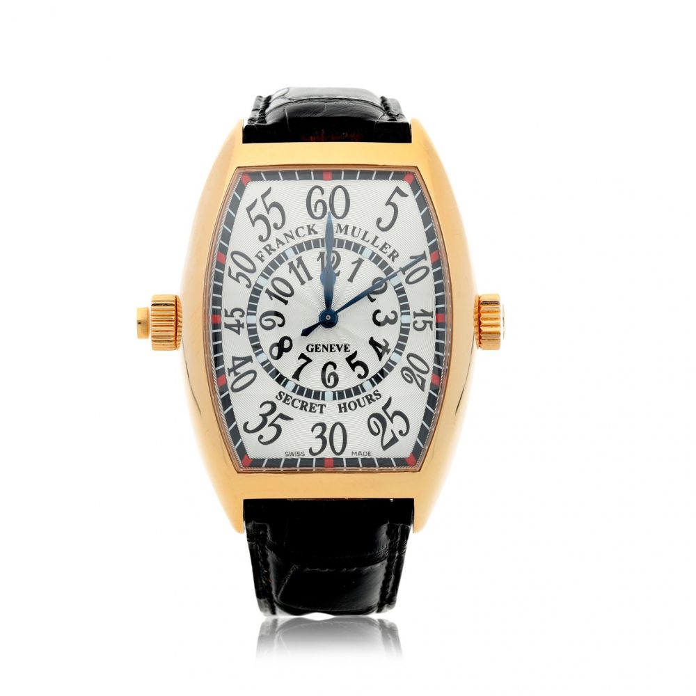 FRANCK MULLER | REFERENCE 7880 SE H II SECRET HOURS A YELLOW GOLD TONNEAU FORM AUTOMATIC CENTER SECONDS WRISTWATCH, CIRCA 2010