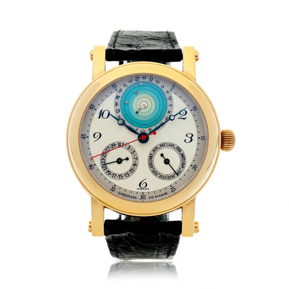 CHRISTIAAN VAN DER KLAAUW | PLANETARIUM 2000 A YELLOW GOLD AUTOMATIC WRISTWATCH WITH MONTH, DATE, AND PLANETARIUM APERTURE DEPICTING THE RELATIVE PLACEMENT OF THE PLANETS AROUND THE SUN, CIRCA 2000