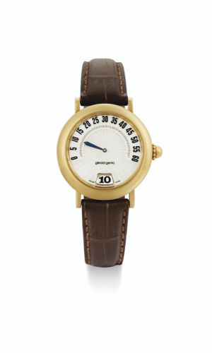 Gérald Genta.A YELLOW GOLD AUTOMATIC JUMP HOUR WRISTWATCH WITH RETROGRADE MINUTE AND MOTHER-OF-PEARL DIAL RETRO CLASSIC CIRCA 2000