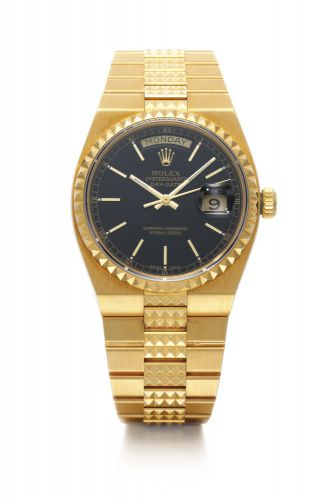 Rolex.A FINE YELLOW GOLD CENTRE SECONDS WRISTWATCH WITH DAY DATE AND BRACELET REF 19028 CASE R428091 OYSTERQUARTZ DAY-DATE CIRCA 1987