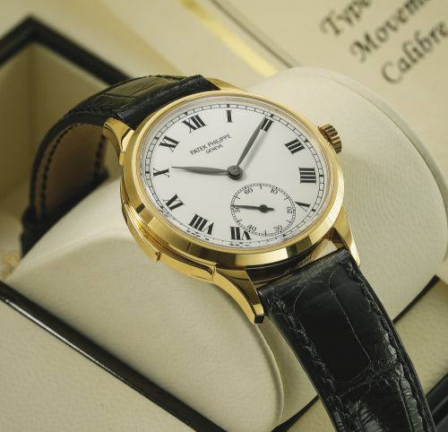 Patek Philippe.A VERY FINE AND RARE YELLOW GOLD AUTOMATIC MINUTE REPEATING WRISTWATCH WITH PORCELAIN-WHITE DIAL REF 3979 MVT 1904012 CASE 2867025 MADE IN 1990