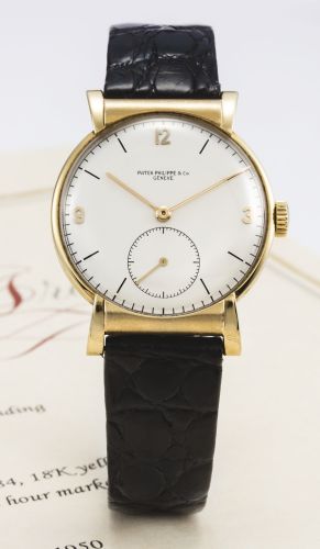 Patek Philippe.A YELLOW GOLD WRISTWATCH REF 1584 MVT 966082 CASE 658905 MADE IN 1950.A YELLOW GOLD WRISTWATCH REF 1584 MVT 966082 CASE 658905 MADE IN 1950