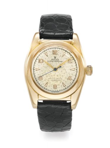 Rolex.A PINK GOLD AUTOMATIC CENTRE SECONDS WRISTWATCH REF 5011 CASE 636408 BUBBLEBACK CIRCA 1949.A PINK GOLD AUTOMATIC CENTRE SECONDS WRISTWATCH REF 5011 CASE 636408 BUBBLEBACK CIRCA 1949