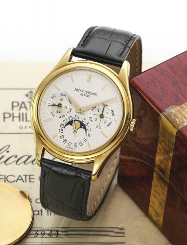Patek Philippe.A RARE YELLOW GOLD PERPETUAL CALENDAR WRISTWATCH WITH MOON-PHASES AND LEAP YEAR INDICATION REF 3941 MVT 771702 CASE 2859483 MADE IN 1989.A RARE YELLOW GOLD PERPETUAL CALENDAR WRISTWATCH WITH MOON-PHASES AND LEAP YEAR INDICATION REF 3941 MVT