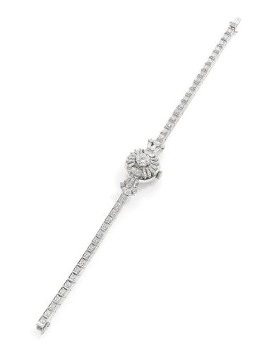 International Watch Co..AN ELEGANT LADY'S WHITE GOLD AND DIAMOND-SET CONCEALED DIAL BRACELET WATCH REF 9235 MVT 1822195 CASE 1367951 CIRCA 1968.AN ELEGANT LADY'S WHITE GOLD AND DIAMOND-SET CONCEALED DIAL BRACELET WATCH REF 9235 MVT 1822195 CASE 1367951 CI