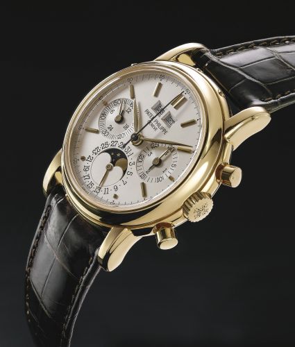 Patek Philippe.A FINE AND VERY RARE YELLOW GOLD PERPETUAL CALENDAR CHRONOGRAPH WRISTWATCH WITH REGISTER MOON-PHASES AND SNAP-ON SAPPHIRE CRYSTAL BACK DISPLAY REF 3971J FIRST SERIES MVT 875078 CASE 2824140 MADE IN 1987.A FINE AND VERY RARE YELLOW GOLD PERP