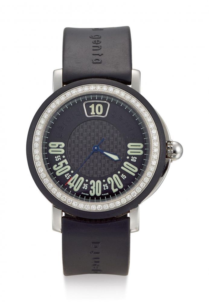 GÉRALD GENTA | RETRO SPORT, REFERENCE G.3694, A STAINLESS STEEL, RUBBER AND DIAMOND-SET WRISTWATCH WITH JUMPING HOUR AND RETROGRADE MINUTE, CIRCA 2005