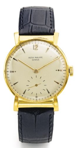 Patek Philippe.A YELLOW GOLD WRISTWATCH WITH HOODED LUGS REF 1584 MVT 938167 CASE 667729 MADE IN 1952