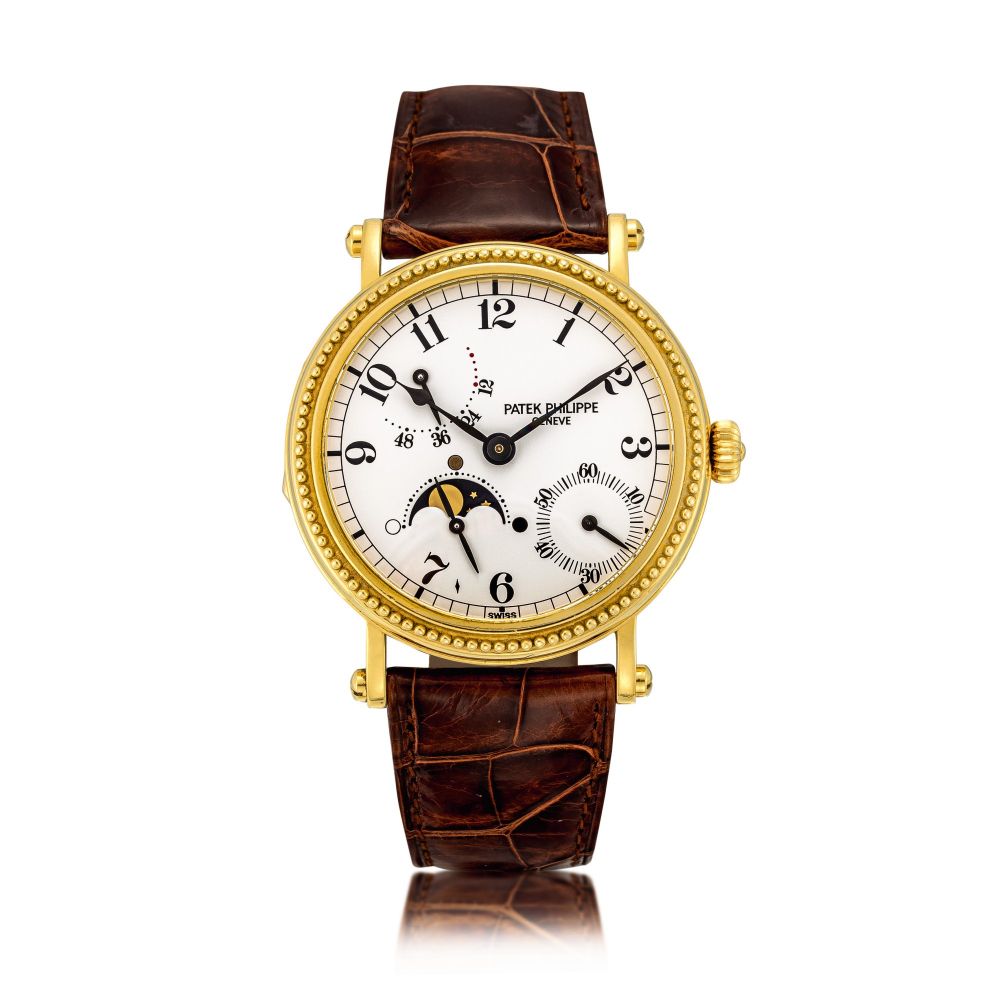 Patek Philippe | Reference 5015, A yellow gold wristwatch with moon phases and power reserve indication, Made in 1995 | 百達翡麗 | 型號5015 黃金腕錶，備月相及動力儲備顯示，1995年製