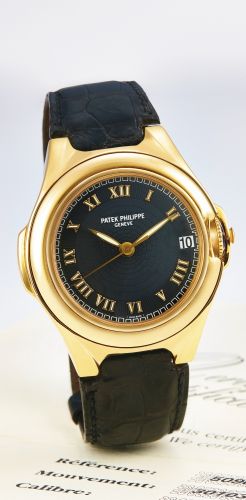 Patek Philippe.A YELLOW GOLD AUTOMATIC WRISTWATCH WITH DATE REF 5090J-001 SCULPTURE MVT 3010378 CASE 4064270 CIRCA 1999.A YELLOW GOLD AUTOMATIC WRISTWATCH WITH DATE REF 5090J-001 SCULPTURE MVT 3010378 CASE 4064270 CIRCA 1999