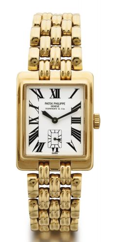Patek Philippe RETAILED BY TIFFANY CO.: A YELLOW GOLD WRISTWATCH WITH BRACELET REF 5010/1 MVT 1846955 CASE 2967510 GONDOLO MADE IN 1995