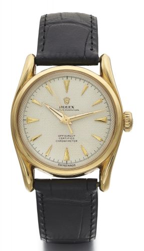 Rolex A YELLOW GOLD AUTOMATIC CENTRE SECONDS WRISTWATCH REF 6090 CIRCA 1950