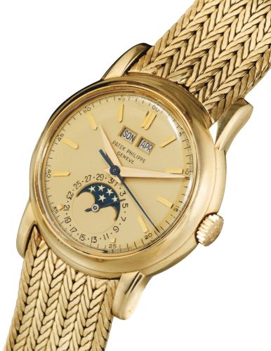 Patek Philippe AN IMPORTANT AND RARE YELLOW GOLD CENTRE SECOND PERPETUAL CALENDAR WRISTWATCH WITH MOON PHASES AND BRACELET REF 2438-1 MVT 888108 CASE 687973 MADE IN 1954