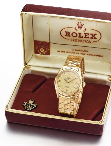 Rolex RETAILED BY JOYERIA RIVIERA: A FINE AND RARE PINK GOLD AUTOMATIC SWEEP SECONDS WRISTWATCH WITH BRACELET REF 6284 CASE 975478 CIRCA 1954