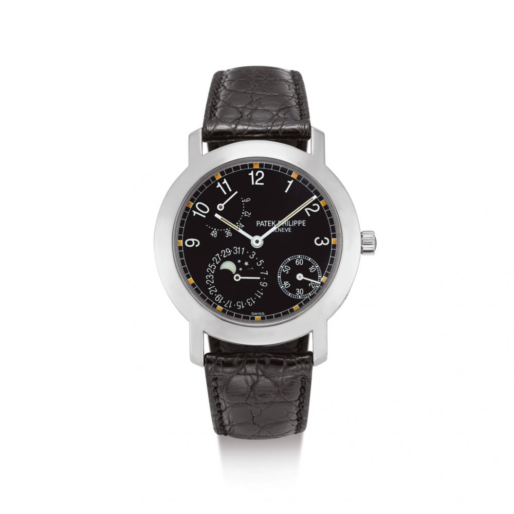 PATEK PHILIPPE | REFERENCE 5055 A WHITE GOLD WRISTWATCH WITH DATE, MOON PHASES AND POWER RESERVE INDICATION, CIRCA 1998 | 百達翡麗 | 型號5055 白金腕錶，備日期、月相及動力儲備顯示，機芯編號3109151，錶殼編號4023181，約1998年製