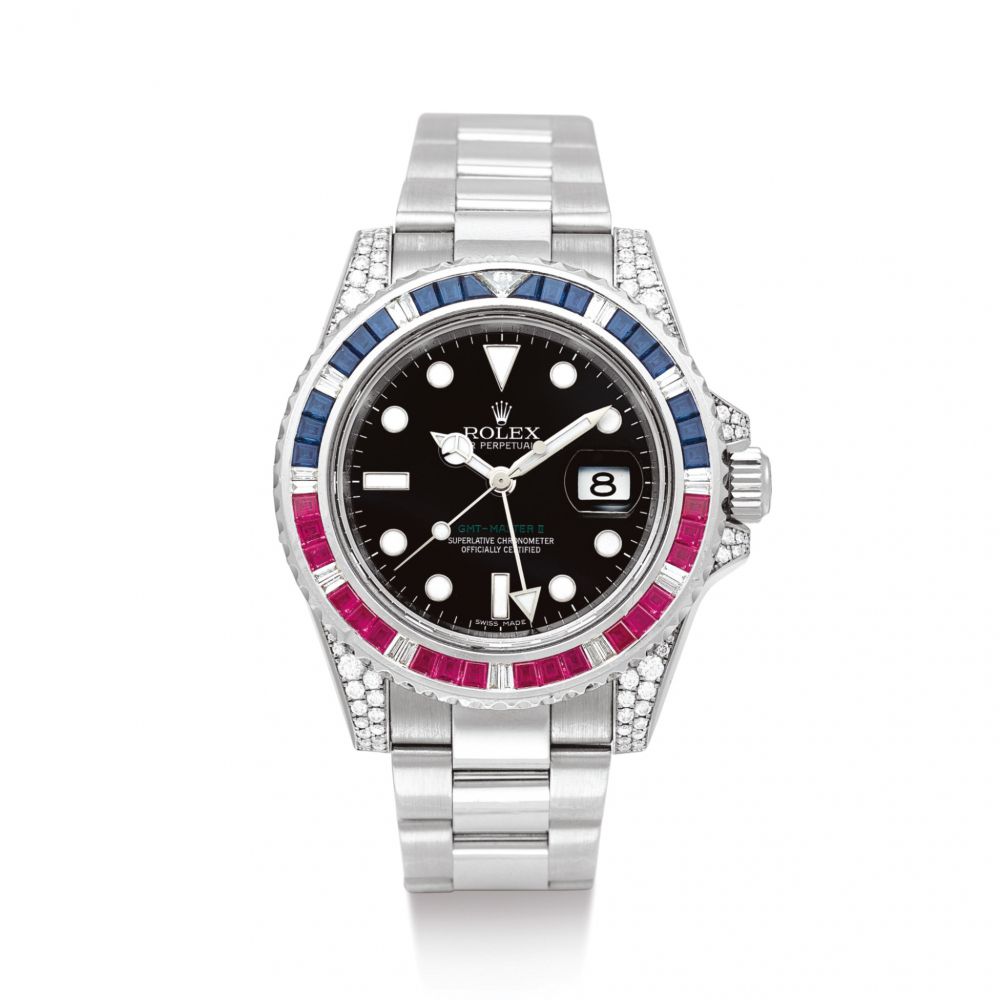 ROLEX | GMT-MASTER II, REFERENCE 116759 SARU A WHITE GOLD DIAMOND, SAPPHIRE AND RUBY-SET DUAL TIME ZONE WRISTWATCH WITH DATE AND BRACELET, CIRCA 2009 | 勞力士 | GMT-Master II 型號116759 SARU 白金鑲鑽石、藍寶石及紅寶石兩地時間鏈帶腕錶，備日期顯示，錶殼編號V743389，約2009年製