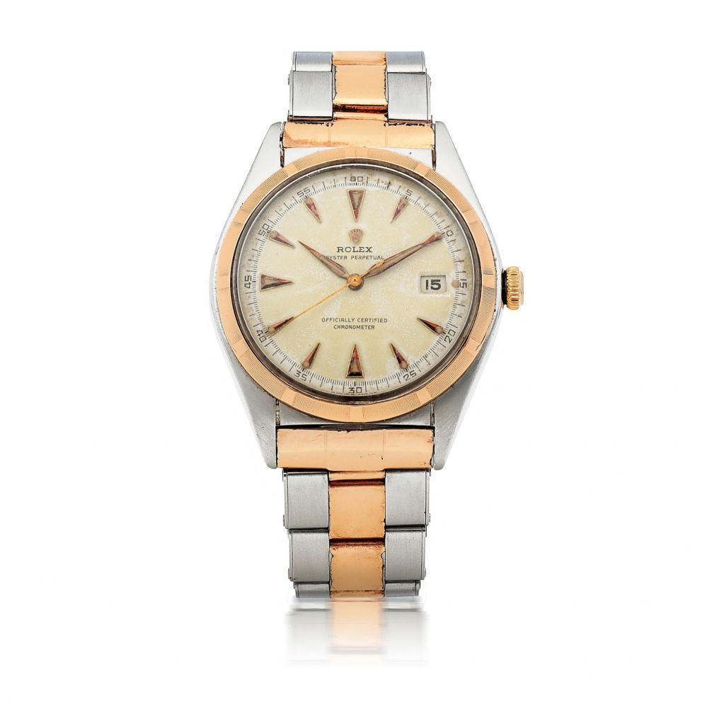 ROLEX | ‘BUBBLEBACK’ OYSTER PERPETUAL, REF 5031 STAINLESS STEEL AND PINK GOLD WRISTWATCH WITH DATE AND BRACELET CIRCA 1948