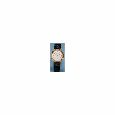 A GOLD CIRCULAR WRISTWATCH WITH LARGE STEPPED FLARED LUGS PATEK PHILIPPE REF.2453 CA 1950