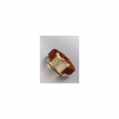 PATEK PHILIPPE CO. NO.976301 REF.2520 RARE MASSIVE GOLD CURVED WRISTWATCH UNUSUAL LUGS