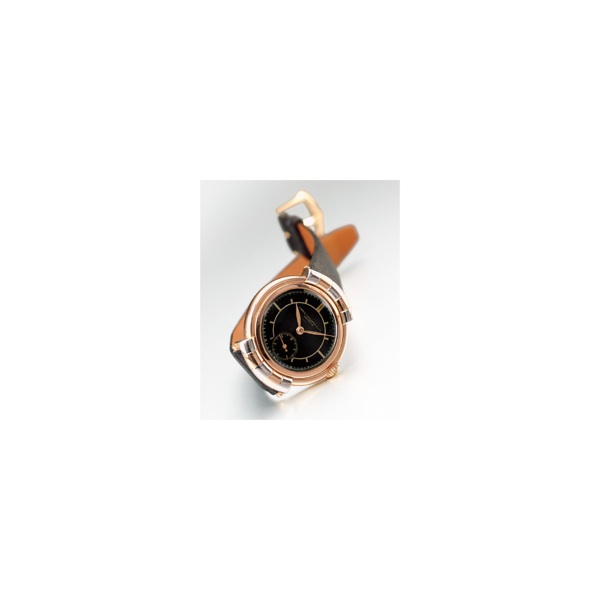 A RARE TWO COLOR GOLD WRISTWATCH WITH HOODED LUGS AND BLACK DIAL, PATEK PHILIPPE CO., GEN