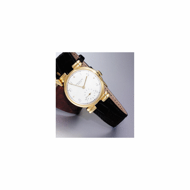 PATEK PHILIPPE, 1944, NO.924.573, REF.1565, A RARE GOLD CIRCULAR WRISTWATCH WITH UNUSUAL LUGS
