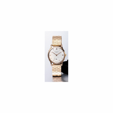 PATEK PHILIPPE, CIRCA 1950, 969.702, REF.1516, A PINK GOLD CIRCULAR WRISTWATCH WITH BRACELET