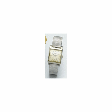 A FINE AND EXTREMELY RARE WHITE GOLD CURVED RECTANGULAR WRISTWATCH, PATEK PHILIPPE CO., GEN