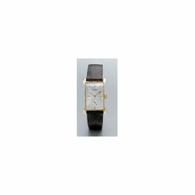 A FINE AND RARE PINK GOLD RECTANGULAR WRISTWATCH WITH UNUSUAL LUGS, PATEK PHILIPPE CO., GEN