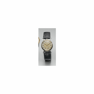 A FINE AND RARE STAINLESS STEEL AND PINK GOLD WRISTWATCH WITH UNUSUAL SCROLL LUGS AND CROWN AT 12 O'CLOCK, PATEK PHILIPPE CO., GEN