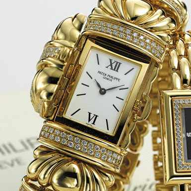 PATEK PHILIPPE, A LADY'S GOLD AND DIAMOND SET BRACELET WATCH WITH CONCEALED DIAL CIRCA 2002, NO. 1.970.408, REF. 4955