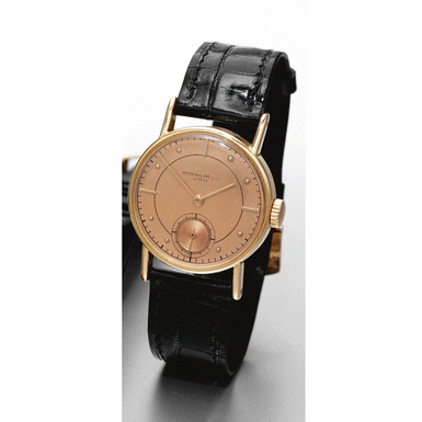 PATEK PHILIPPE - A pink gold circular wristwatch with pink dial 1941, no.921.469, ref.534